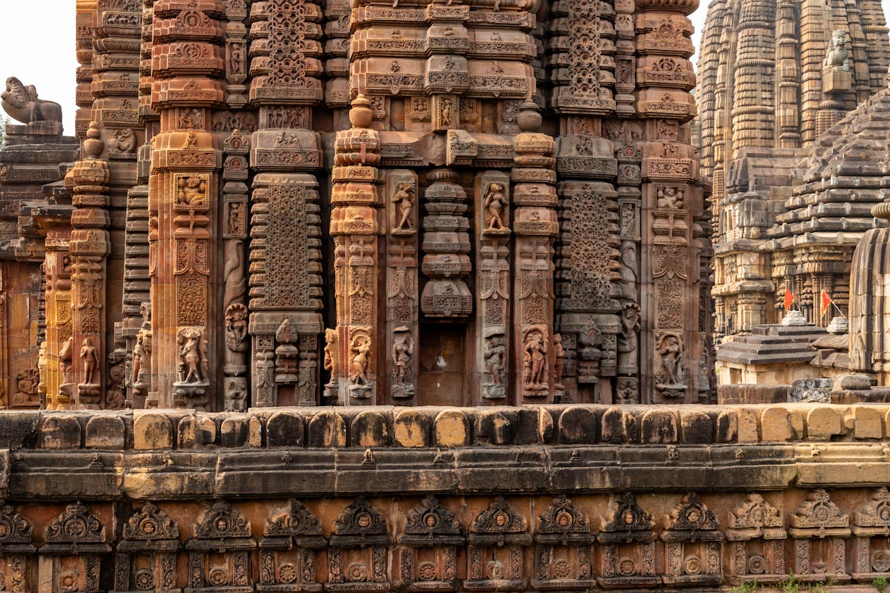 Detailed view of the Brahmeswara Temple's exquisite stone carvings in Bhubaneswar, India.